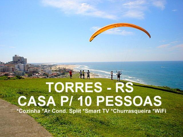 Casa De 2 Quartos Com 2 Ares-Condicionados Em Torres-Rs - Na Mais Bela Praia Gaucha - Cozinha - Banheiro - Tv Smart 32 E Wi-Fi - Estacionamento - Anfitria Superhost No Bnb Villa Exteriör bild